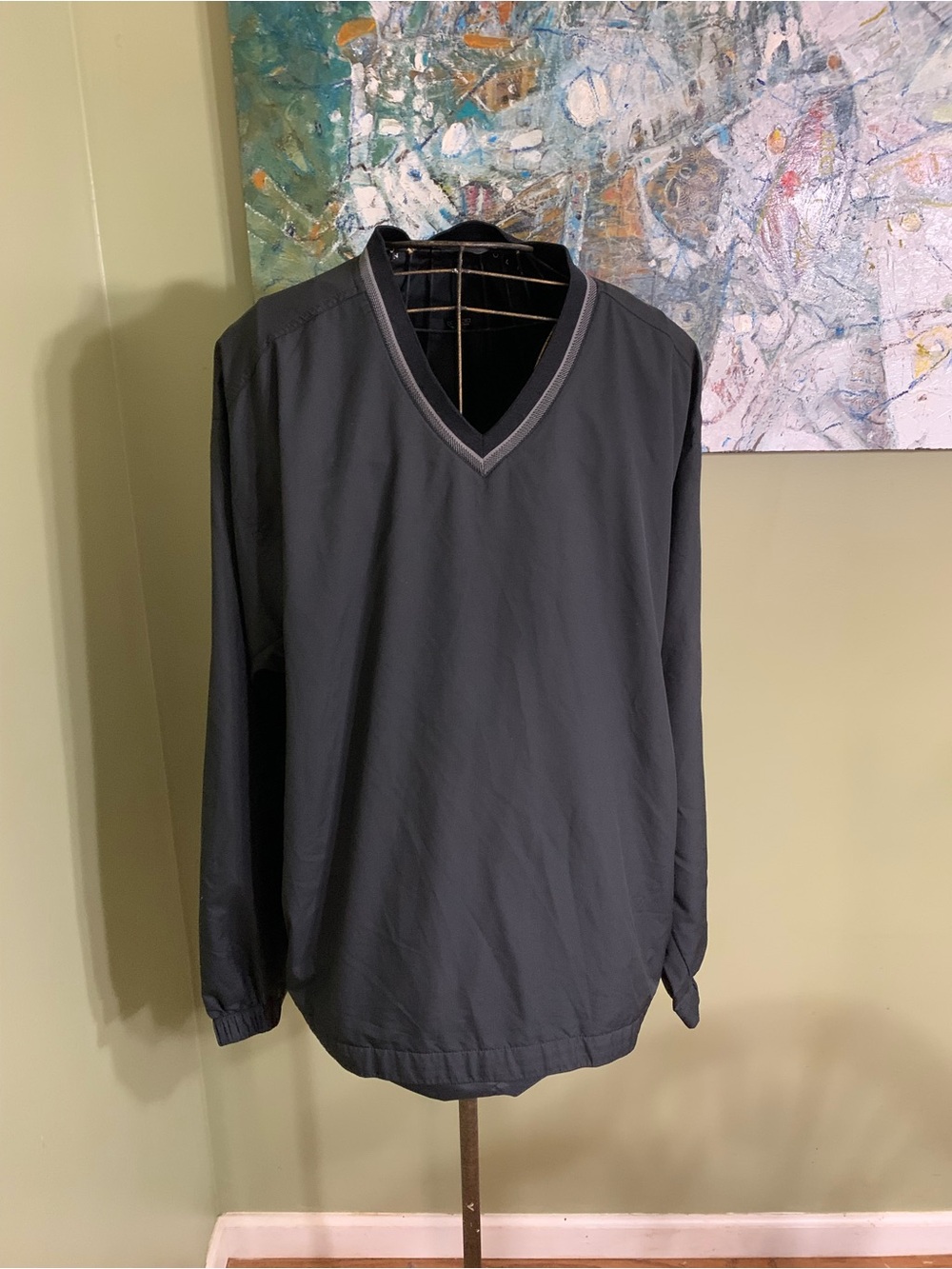 Men’s Nike golf pull over jacket in size XL.